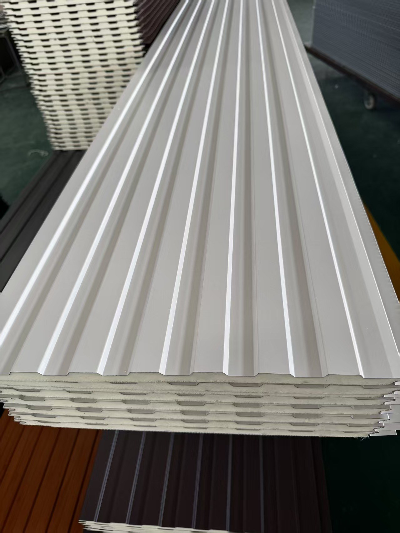 Ribbed insulated panels for warehouse walls