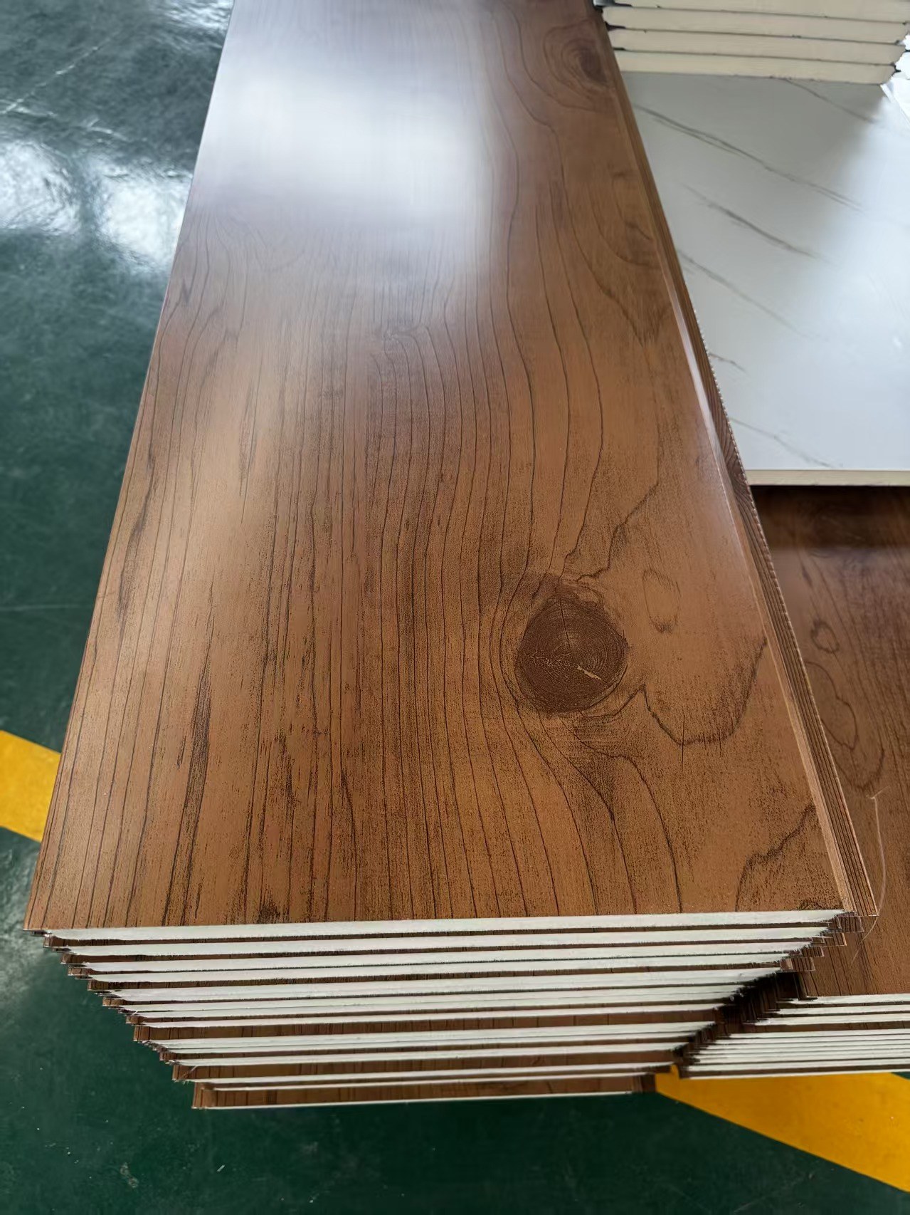 Brown wood grain insulated wall panel